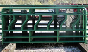 Green steel stack feeder for round hay bales