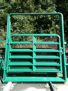 Green-painted walk-through farm gate